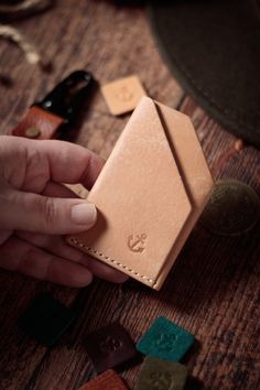 If you are looking for a simple and elegant way to store your cards, you might want to consider a handmade leather card holder. The Bandito card holder is a durable and stylish accessory that can keep your cards organized and protected. Unlike mass-produced card holders, a handmade leather card holder is crafted with care and attention to detail, using high-quality leather and stitching. A handmade leather card holder also has a unique character and charm that reflects your personal taste and st Leather Card Holder With Coin Pocket As Gift, Handmade Leather Card Holder For Gift, Handmade Leather Card Holder Gift, Bifold Card Holder With Card Slots As Gift, Leather Card Holder With Slots As Gift, Classic Handmade Card Holder Gift, Bifold Card Holder With Interior Slots As Gift, Rectangular Card Holder With Coin Pocket As Gift, Rectangular Card Holder With Coin Pocket For Gift