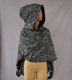 This cape/ shawl has a dilisious large hood. With a large scarf that gives you room to play. The hood is fully lined with the softest organic cotton. On the scarf are two ribbons that you can use to bind the scarf behind your neck. This creation has structured serger seams on the outside. You can go a lot of ways with this piece. Dress up for a costume party, go full outfitted with your larp costume or as a every day statement piece. Designed and handmade by Solmode in the Netherlands. * Materia Black Hooded Cape, Victorian Shawl, Swamp Thing, Cape Shawl, Larp Costume, Black Cape, Hooded Cape, Hooded Scarf, Large Scarf