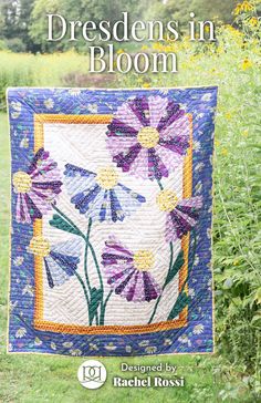 a book cover with purple flowers on it and the title, dresdens in bloom