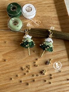 some beads and thread on a table