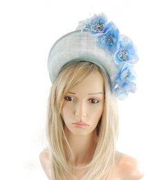 Hats By Cressida Kentucky Derby & Ascot Fascinator Hats Spring Summer Hat & Fascinator Collection Skylar Fascinator Hat Gorgeous silk roses with a halo crown style base Base measures about 8cm high.  Mounted with a matching headband. If you prefer a headband to match your hair, please make a note at check out what colour headband you want. We make each hat to order and can add or change colours just email us with what you need.  We can also make a custom design for you if you have something else Blue Mini Hats With Handmade Flowers For Royal Ascot, Light Blue Headpieces For Spring Wedding, Blue Summer Wedding Costume Hats And Headpieces, Blue Costume Hats And Headpieces For Summer Wedding, Blue Headpieces For Spring Weddings, Summer Blue Headpiece With Handmade Flowers, Spring Blue Mini Hats With Handmade Flowers, Blue Mini Hat For Royal Ascot Wedding, Blue Headpieces For Summer Garden Party