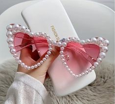 "💖 Make Your Special Day Shine with Personalized Heart-Shaped Sunglasses! 💖 👰 Are you a bride-to-be looking for the perfect accessory to make your wedding day unforgettable? Look no further! Our stunning personalized heart-shaped sunglasses are the ideal addition to your wedding ensemble, offering both style and functionality. 🕶️ Key Features 🕶️ 🌟 Personalized Perfection: Each pair is customized with the bride's name and the wedding date, making them a unique keepsake from your special day. 😎 Heart-Shaped Elegance: Our sunglasses feature a timeless heart-shaped frame that adds a touch of romance to your bridal look. 🎁 Thoughtful Gift: Surprise your bridesmaids with matching pairs, creating picture-perfect moments that will be cherished forever. 🎨 Customization Options 🎨 Choose yo Bling Sunglasses, Hip Hop Women, Glitter Frame, Heart Glasses, Heart Shaped Frame, Shaped Sunglasses, Sunglasses Women Fashion, Cute Glasses, Heart Shaped Sunglasses