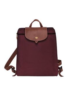 A timeless and durable nod to French style, Longchamp's nylon backpack stows everyday essentials for a tres-chic hands-free commute. Long Champ Bag, Le Pliage Medium, Longchamp Le Pliage Medium, Longchamp Backpack, Commuter Backpack, Medium Backpack, Burgundy And Gold, Tres Chic, Everyday Essentials