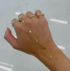 18k gold over brass Stars: 5mm  Bracelet: 6 inches Hand Chain Bracelet, List Ideas, Hand Chain, Fancy Jewelry, Jewelry Inspo, Chain Ring, Christmas List, Cute Jewelry, Chain Bracelet