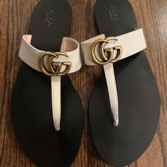 Never Worn Before. Size Is 40.5 Which Jn Us Fits A 9/9.5 Women’s Size Gucci Leather Sandal With "Gg" Stud. Flat Heel. Thong Strap. Slide Style. Leather Lining. Smooth Outsole. Made In Italy. No Bag Or Box Gucci Designer Sandals With Single Toe Strap, Designer Gucci Sandals With Single Toe Strap, Classic Gucci Leather Sandals, Chic Gucci Sandals With Single Toe Strap, Elegant Gucci Flat Sandals, Gucci Sandals Woman Outfit, Gucci Sandals Woman, Green Pakistani Bridal Dress, Gucci Slides Women