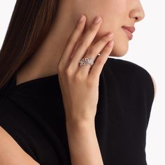 Designed to suggest a duo of diamond butterflies have momentarily alighted upon the finger, our Double Butterfly Silhouette ring in white gold is a captivatingly contemporary expression of the iconic Graff motif. Featuring two graceful butterflies that embrace the finger, this elegant ring showcases several delicate wings depicted in pavé diamonds. The Butterfly Silhouette collection features other stylish designs like a long-length necklace, alongside simple diamond studs, necklaces, bracelets and rings. An enchanting Double Butterfly Silhouette pavé diamond ring with a total weight of approximately 0.40 carats. Evening Diamond Ring With Diamond Accents, Elegant Butterfly Ring With Brilliant Cut For Formal Occasions, Luxury Butterfly Ring With Brilliant Cut For Wedding, Luxury White Gold Butterfly Ring For Wedding, Luxury White Butterfly Ring For Formal Events, Luxury White Butterfly Ring For Formal Occasions, Formal Brilliant Cut Butterfly Ring, Luxury Butterfly Ring With Diamond Accents For Formal Occasions, Luxury Formal Butterfly Ring With Diamond Accents