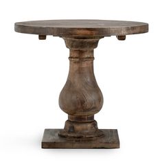 an old wooden table with two legs and a round top, on a white background