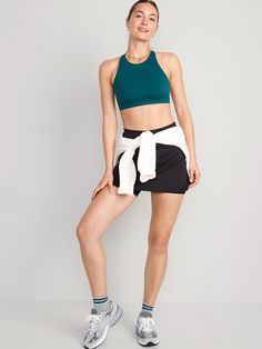 Power up in our PowerSoft skort -- light compression fabric meets a ridiculously smooth, peachy-soft feel Elasticized extra high-rise waistband, with light-reflecting Old Navy Active logo at center back.  Quick-drying, breathable woven skirt dries in High Stretch Athleisure Skort With Built-in Shorts, Activewear With Built-in Shorts And 4-way Stretch, Stretch Athleisure Skort With Built-in Shorts, Athleisure Skort With Built-in Shorts For Yoga, High-waist Nylon Activewear With Built-in Shorts, Green 4-way Stretch Workout Skort, Athleisure Workout Skort With Built-in Shorts, Green 4-way Stretch Skort For Workout, Versatile Mid-thigh Athletic Shorts With Built-in Shorts