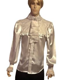 "Men's dress shirt with hidden buttons band and Club style ruffled collar with one covered button at the neck band. A lace bib embellished with satin ruffles. Has plastic buttons at the buttons band, shaped hem and detachable 100% silk Satin Organza Jabot. Wide Extra Long Puff Sleeve shirt. Standard Cuffs style with 2 buttons and lace Ruffles. Shaped hem.  -  Please, take a look at the last picture for available colors      Mannequin Height- 6.2 Feet Fabric:  Charmeuse Satin - 100% Polyester, ma Classic Formal Blouse With Pearl Buttons, Formal Blouse With Pearl Buttons, Elegant Formal Blouse With Ruffled Collar, Formal Blouse With Lace Trim And Ruffled Collar, Formal Satin Blouse With Buttons, Formal Fitted Blouse With Ruffled Collar, Classic Lace Blouse For Formal Occasions, Formal Lace Blouse With Buttons, Elegant Party Blouse With Pearl Buttons