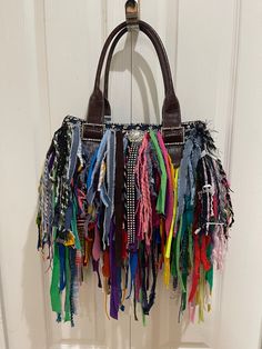 Fringed handbag,Custom fringe Bag,fabric fringe bag,statement handbag,fringe shoulder bag,beaded fringe bag,bling fringe bag BEFORE I start with my description i wanted to let you know I CAN WORK WITH ANY BUDGET. I can build a handbag to FIT ANY BUDGET. Just drop me a line and tell me what you want and i'll let you know what type/size/shape/design handbag i can produce for that amount. THIS HANDBAG HAS BEEN SOLD...BUT... I can custom make one for you. This item is custom made and ONE OF A KIND. Bling Purses, Sew Bags, Jean Purses, Statement Handbag, Fringe Handbags, Flower Handbag, Bag Flower, Fringe Purse, Form Crochet