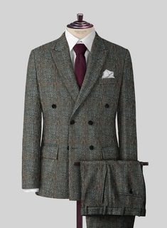 Looking for that perfect quintessential cold weather outfit? our Harris Tweed Country Gray suit will surely end your search. Crafted from pure wool, the multicolored weave adds interest to the outfit, also helps demonstrate your fashion sense and packs well for those business trips or quick getaways. Pair it with a white shirt, brown tie and black derby for complete assemblage. 
 
 Look Includes  Harris Tweed Country Gray Fabric  Double Breasted Jacket Style  Peak Lapel  Real Horn Royal Buttons Winter Tweed Semi-formal Suit, Tweed Suits For Winter Semi-formal Occasions, Tweed Notch Lapel Suit For Business Casual, Business Casual Tweed Suits With Notch Lapel, Business Plaid Wool Tweed Jacket, Plaid Wool Tweed Jacket For Business, Plaid Wool Tweed Jacket For Tailoring, Plaid Tweed Business Blazer, Business Plaid Tweed Blazer