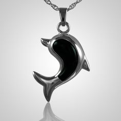 The Dolphine Cremation Jewelry is sterling silver with onyx and crafted by an artistic skilled jeweler one at a time. The quality is excellent and the craftsmanship is outstanding. This Keepsake Pendant holds a small amount of remains, a piece of hair or something that is small enough to memorialize your loved one and bring them close to your heart. Oval White Gold Jewelry With Black Enamel, Symbolic Gemstone Jewelry For Formal Occasions, Sterling Silver Necklace With Black Enamel, Unique Silver Keepsake Jewelry, Sterling Silver Jewelry With Shiny Finish And Oval Shape, Oval Sterling Silver Jewelry With Shiny Finish, Silver Pendant With Black Enamel, Classic Sterling Silver Jewelry With Black Enamel, Oval Silver Jewelry With Shiny Finish