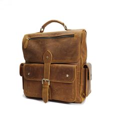 Our classic leather backpack available in brown and coffee colors which is as timeless as it is versatile. It is perfect for daily use as a book bag. gym bag or travel bag on a long journeys. This luxury leather backpack can comfortably accommodate a 14â€?laptop and A4 notepad.This product will be shipped by Expedited Free DHL shipping method.Features 100% full grain leather 14.6" x 14.6" x 7.1â€?/li> About 4 Ibs Multi outside pockets Safe buckle closure Hidden inside zipper pocket Everyday Brown Laptop Backpack, Classic Leather Backpack With Leather Lining For On-the-go, Classic Backpack With Leather Lining, Luxury Brown Laptop Backpack, Classic Brown Leather Backpack For Everyday, Classic Brown Leather Backpack For On-the-go, Classic Leather Rectangular Backpack, Classic Backpack With Luggage Sleeve, Everyday Brown Backpack With Leather Lining