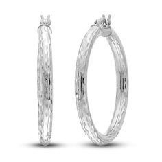 Dynamic 30mm hollow round tubes are embellished with distinctive diamond-cut patterns in these stylish women's hoop earrings. Fashioned in 14K white gold, the earrings secure in place with hinged backs. Jared The Galleria Of Jewelry, Diamond Cut, Stylish Women, Fashion Earrings, Diamond Jewelry, Round Diamonds, Diamond Cuts, Hoop Earrings, White Gold