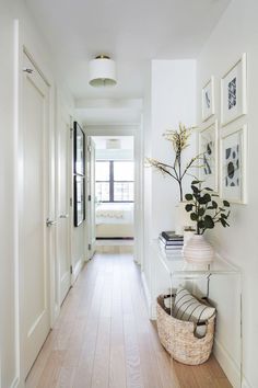 the hallway is clean and ready for us to use as an entrance way in this home