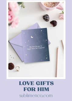 love gifts for him and her on top of a table with pink flowers, chocolates and