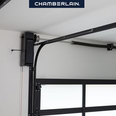 an overhead garage door with the word chaberlainn on it