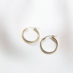 Your search for hoops is over - meet our Everyday Hoop Earrings! They're the perfect earrings to wear for any occasion. They're hypoallergenic and perfect for sensitive ears! Pick from gold fill or sterling silver - materials durable enough for everyday wear. DETAILS Gold filled -or- sterling silver click hoops Available in 3 sizes: small (13mm), medium (22mm), & large (34mm) Comes as a pair Everyday Small Hoop Earrings With Ear Wire, Everyday Small Hoop Single Earring, Nickel Free Hoop Earrings For Everyday, Nickel-free Hoop Earrings For Everyday, Minimalist Everyday Hoop Jewelry, Simple Small Hoop Everyday Jewelry, Everyday Hoop Earrings With Ear Wire, Minimalist Everyday Hoop Earrings, Simple Everyday Hoop Huggie Earrings