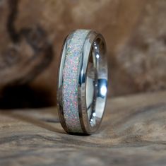 a wedding ring that has been made to look like it is covered in glitter