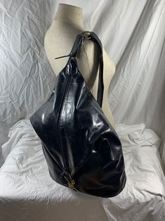 Measurements are 12"2 wide, 16" high and 6"5 deep with a 29" shoulder strap. One large main compartment, unlined interior and a top zipper closure. The leather is nice and strong with aged gold tone hardware and bag is very spacious. There are a few scuffs/marks with no tears and will last you for years to come.  Genuine leather bag and is a great vintage find.    Shipping is done with USPS priority mail within the U.S. Please note I do combine shipping for multiple items. Bell Gardens, Genuine Leather Bags, Beautiful Bags, Tan Leather, Leather Belt, Vintage Men, Leather Crossbody, Vintage Black, Leather Bag