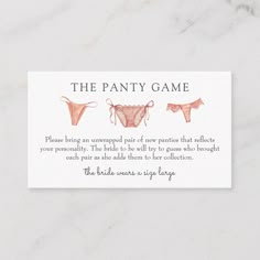 a business card with two bras on it and the text, the fancy game