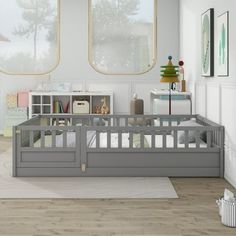 a baby's room with two windows and a crib