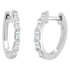 This pair of Diamond Baguette Huggie Hoop Earrings are sure to be your new favorite. With shimmering 0.25 ct. of baguette-cut diamonds adorning the Huggie, they create the perfect amount of sparkle for any look. Crafted in 14k Rose Gold with easy to use latch back posts these diamond earrings are the perfect everyday accessory and an ideal gift for any occasion. 14K Gold 0.25 carats Natural White Diamonds Baguette Cut Diamonds Latch Back Posts Gift Box Included! Ships in 1-2 Business Days! Luxury Gold Baguette Cut Huggie Earrings, Luxury Gold Baguette-cut Huggie Earrings, Luxury Baguette Cut Huggie Earrings For Women, Luxury Baguette Cut Huggie Earrings For Formal Events, Luxury Formal Baguette Cut Huggie Earrings, Luxury Wedding Hoop Earrings With Baguette Cut, Luxury Baguette Cut Diamond Huggie Earrings, Luxury Round Huggie Earrings With Baguette Diamonds, Luxury Baguette Diamond Huggie Earrings For Everyday