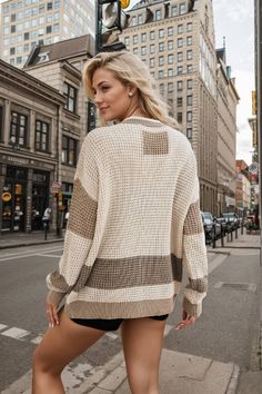 Introducing our Downtown Heritage Color Block Cardigan! This eye-catching cardigan features a unique color block design that will make you stand out anywhere you go. Made with soft materials, this cardigan is not only stylish but also comfortable and durable. Perfect for adding a pop of fun to any outfit. Size Guide: Model is 5’8” tall, and has a 32.6” bust, 24.5”waist, & 35.8” hips. She is wearing a S / US 4 / AU 8. This cardigan is true to size. Feature: V neckline. Long sleeves. Pocketed. Front button closures. Waffle knit fabric. Relaxed Fit. Material: 100% Acrylic. Care Instructions: Machine wash / Cold hand wash.