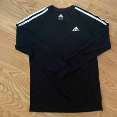 Boys Adidas Long Sleeve Sports Shirt. New Without Tags. Size M. Color Black. Black Adidas Logo T-shirt For Sports Season, Casual Long Sleeve T-shirt For Gym, Black Sporty T-shirt With Athletic Fit, Three Stripes Long Sleeve Sportswear Top, Casual Adidas Logo Top For Workout, Casual Adidas Activewear With Crew Neck, Casual Workout Top With Adidas Logo, Black Activewear With Graphic Print For Training, Casual Adidas Workout Top