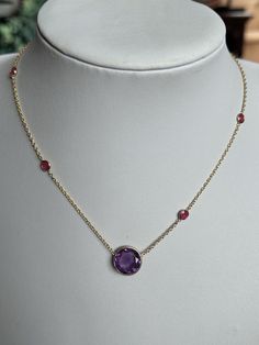 A brand new 18k Gold Vermeil (plated)  necklace. Natural amethyst  stone and smaller ruby stones.  What is Vermeil? Whilst similar to gold plating gold vermeil is distinctly different to it. Gold vermeil originated in the 19th century where gold was applied to sterling silver. Although still using the plating technique gold vermeil requires a thicker layer. At least 2.5 microns of gold.  Stamped 925 silver as this is the base metal with gold vermeil, this was bought as a collection of jewellery with some pieces signed and others not. See my other listings.  Adjustable length (approx) : 40cm/45cm/48cm 3 available Box not included  WELCOME to antiquesandchic, we are a family run business offering good antiques, jewellery and collectables.  We never know what treasures we are going to list ne Luxury Yellow Gold Amethyst Necklace, Luxury Purple Necklaces For Anniversary, Luxury Purple Necklace For Anniversary, Yellow Gold Necklace With Gemstone Accents, Classic Amethyst Purple Necklace, Classic Purple Amethyst Necklace, Classic Hallmarked Amethyst Necklace, Formal Yellow Gold Amethyst Necklace, Yellow Gold Ruby Necklaces With Gemstone Accents