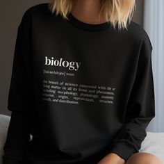 Introducing our Definition Print Clothing Collection - a charming and versatile addition to your everyday life! We're thrilled to introduce you to our 'biology' definition print t-shirts, crewnecks, and hoodies. These are not your regular shirts; they are conversation starters, designed to add a dash of humor and a sprinkle of wit to your everyday attire. These sweathers features a unique 'definition' design that makes it an excellent gift idea for any occasion. Perfect as a funny gift idea or as a unique present that is sure to bring a smile to anyone's face. Our definition shirts are available in a variety of vibrant colors including Red, White, Black, Navy, Royal, and Gray. They come in sizes S, M, L, and XL, ensuring a comfortable fit for everyone. Whether you're looking for a gift for Long Sleeve Slogan Tops As Gifts, Long Sleeve T-shirt With Text Print For Gift, Text Print Long Sleeve T-shirt For Gifts, Biology Definition, Biology Lover, Definition Design, Definition Shirt, Perfect Definition, Funny Presents