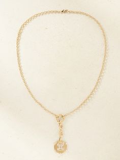 Designed to symbolize true love, Foundrae's necklace will be a special gift for your soulmate,. Handmade from glinting 18-karat gold, it’s strung on a belcher chain with an nautical medallion. It's cornered with scintillating diamonds. Gold-tone Clavicle Chain Jewelry For Wedding, Spiritual Recycled Gold Round Pendant Jewelry, Spiritual Recycled Gold Pendant Jewelry, Minimalist Chain Necklaces For Anniversary, Moon Charm Pendant Necklace For Wedding, Moon Charm Round Pendant Jewelry For Her, 14k Gold-filled Yellow Gold Pendant Necklace, Elegant Moon Charm Necklace For Wedding, Spiritual Jewelry With Round Pendant Clavicle Chain