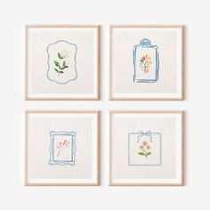 four framed pictures with flowers on them