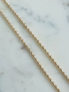 Chain Length: 20", 24" Chain Width: 3mm About Gold Filled Jewelry:What is gold-filled? We carry gold filled jewelry that is composed of a solid layer of 18kt gold, that is bonded to a base metal. Gold Filled and vermeil jewelry are great quality alternatives to solid gold. With proper care and storage, you will have jewelry that will last a lifetime. Tips to make your jewelry last:1. Keep it dry. Store your jewelry in the plastic bag included in your purchase.2. Avoid harsh chemicals such as per Gold Necklace Women, Vermeil Jewelry, Gold Filled Earrings, Personalized Bracelets, Pendant Bracelet, Stainless Steel Necklace, Gold Filled Jewelry, Chains For Men, Gold Filled Chain