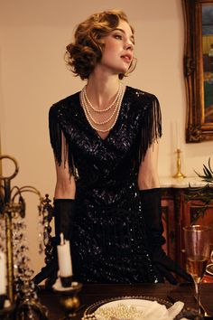 This sumptuous piece of jewelry features a retro-elegant yet slightly modern style that complements the lavish garments, reminiscent of the roaring 1920s. Features: Lustrous imitation pearls Minimalist design 69 inch / 175cm long Pearl size: 8mm in diameter Evening Gatsby Style V-neck Flapper Dress, Vintage V-neck Flapper Dress For Party, Vintage V-neck Flapper Dress For Evening, Glamorous V-neck Flapper Dress For Evening, Evening V-neck Flapper Dress, Elegant V-neck Flapper Dress For Night Out, Vintage Flapper Dress For Evening Party Season, Formal Flapper Dress For Party Season, Glamorous Black Flapper Dress For Formal Occasions