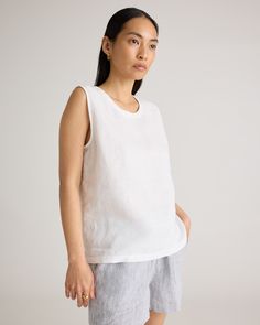 An all-year essential. This linen tank top is made from soft, textured 100% organic linen. It's perfect to layer under a cardigan or does just as well on its own on those warmer days. Especially with the matching linen pants.  | Quince | Women's Tank Top in White, Size Large, Linen Relaxed Fit Tank Top For Spring Everyday Wear, Relaxed Fit Tank Top For Everyday Spring Wear, Basic Relaxed Fit Tank Top For Everyday, Basic Sleeveless Loungewear Tops, Comfortable Everyday Summer Tank Top, Relaxed Sleeveless Tank Top For Spring, Relaxed Fit Spring Tank Top, Relaxed Fit Tank Top For Spring, Effortless Cotton Tank Top