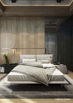 a modern bedroom with wood paneled walls and flooring, along with a large bed