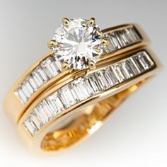 a gold ring with baguettes and diamonds