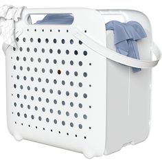 the laundry basket is white and has blue bows on it's handlebars