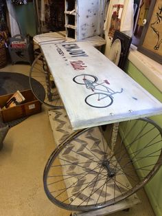 a bicycle wheel is sitting on top of a table