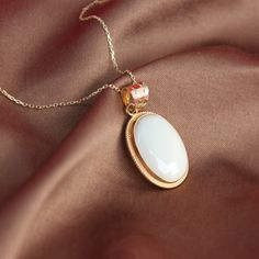 "Real Mother of Pearl Necklace 14k Gold Raw White Nacre Oval Necklace Vintage Style Boho Necklace Handmade Jewelry Christmas Gift For Women ▶ 𝙋𝙍𝙊𝘿𝙐𝘾𝙏 𝙁𝙀𝘼𝙏𝙐𝙍𝙀𝙎 * 14k Yellow Gold Mother of Pearl Necklace * Mother of Pearl Width : 1.23 cm ( 0.48 in) * Mother of Pearl Lenght : 1.75 cm ( 0.68 in) * Mother of Pearl Necklace Total Size : 1.55 cm x 2.38 cm ( 0.61 x 0.93 in) * Mother of Pearl Necklace Height: 4.95 mm ( 0.19 in) * Available in 5 different chain lengths: 42cm (16.5 in), 44cm White High Luster Fine Jewelry Necklace, Gold Oval Pendant Necklaces With Cabochon, Gold Necklaces With Oval Pendant Cabochon, Gold Necklaces With Oval Cabochon Pendant, Gold Oval Pendant Necklace With Cabochon, Gold Oval Cabochon Jewelry As A Gift, Gold Oval Cabochon Jewelry Gift, Elegant Oval Pendant Necklace For Her, Elegant Oval Pendant Necklace As A Gift For Her