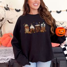 If you love coffee, pumpkin spice, and Halloween, then this sweatshirt is perfect for you! The Halloween Fall Coffee Sweatshirt features a ghost pumpkin, a witch, and a haunted house, making it the perfect way to show your love for all things Halloween! This sweatshirt is made of soft, comfortable fabric, and it's machine-washable for easy care. It's available in sizes Small-5XL, so you're sure to find the perfect fit. And best of all, it ships for free within the USA! So don't wait, order your Coffee Crewneck, Coffee Pumpkin Spice, Cozy Halloween, Spice Coffee, A Haunted House, Pumpkin Spice Coffee, Coffee Sweatshirt, Spiced Coffee, Halloween Sweater