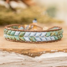 a close up of a bracelet on a table