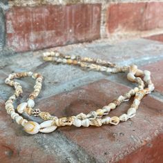 This Brand New With Tag Puka Necklace Is A Classic. Earth Tone Shells On A Creamy Background. I Have 3 Others- Bundle And Save For A Sweet Layered Look! 18” Long A In Bin Z Vintage White Necklace For Beach, Vintage Long Necklace Jewelry For Beach, White Multi-strand Necklaces For Beach, White Multi-strand Beach Necklaces, Vintage Multi-strand Jewelry For Beach, White Multi-strand Beach Necklace, Puka Necklace, Adjustable Multi-strand Shell Necklace For Beach, Vintage Multi-strand Jewelry For The Beach