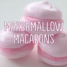 three pink marshmallow macarons stacked on top of each other with the words marshmallow macaroons above them