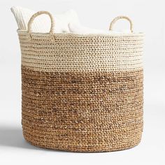 a large woven basket with two handles