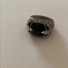 Stunning And Unique Men’s Ring In A Size 10. Eagles On Both Sides Holding The Black Onyx In Their Beaks. Stone Measures Approximately 10cttw. There Are A Couple Of Minor Scuffs On The Stone That Are Not Noticeable But Wanted To Disclose. S Ring, Mens Silver Rings, Mens Accessories Jewelry, Onyx Ring, The Stone, Ring Silver, Black Onyx, Eagles, The Black