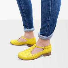 "These lovely summer mary jane shoes are of a yellow matt leather look. They have a hole punch design on the front with a t-bar shape and a buckle fastening to the side. Outer and inner material - perforated leather, closure - buckle fastener, sole - manmade, heel - 2.5 cm / 1.0\". --------Size Conversion & Feet Measurements-------- EU 34 US 4.0 UK 1.0 | 22.5 cm / 8.85\" EU 35 US 5.0 UK 2.0 | 23.0 cm / 9.05\" EU 36 US 6.0 UK 3.0 | 23.5 cm / 9.25\" EU 37 US 6.5 UK 4.0 | 24.5 cm / 9.64\" EU 38 Shoes Yellow, Custom Made Shoes, Oxford Boots, Womens Mary Janes, Shoes Custom, Croc Leather, Leather Mary Janes, Jane Shoes, Perforated Leather