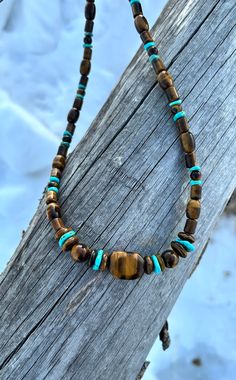 "This gorgeous tigers eye necklace is made with a variety of beautiful tigers eye beads ranging from 8mm to  14 x 25mm. It is accented with turquoise Freeform disk beads. Length is 23 1/2\"  $75 Item 737B" Tigers Eye Necklace, Tiger Eye Beads, Eye Beads, Tigers Eye, Eye Necklace, Tiger Eye, Beaded Necklace, Jewelry Necklaces, Turquoise