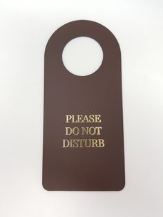 a door hanger that says please do not disturb